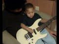 karim playing the guitar