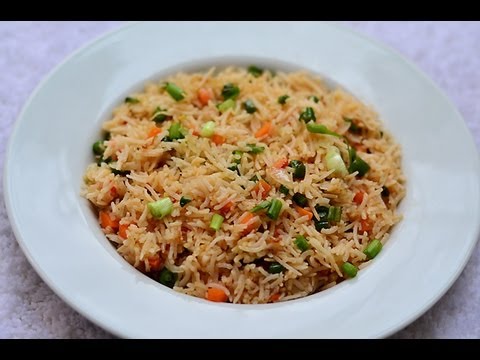 veg - Veg Fried Rice is an Indo Chinese recipe, that combines the flavours of beans and carrots stir fried along with spring onions and tossed with par boiled rice...
