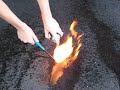 Spra can Flamethrower lights concrete on fire. Spra can Flamethrower lights concrete on fire.