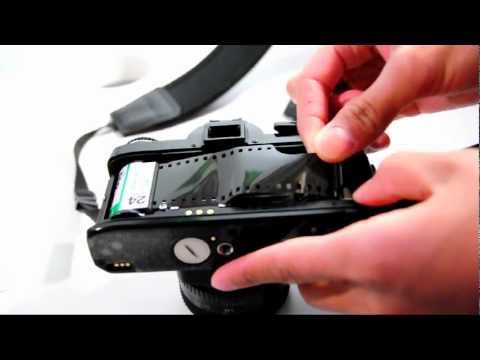 how to open a minolta x 700 camera