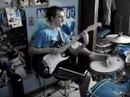 David Helweg on the drums and guitar