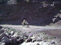 Dr350 pasando cascada...