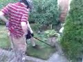 Teaching Devlyn how to weed-wack Teaching Devlyn how to weed-wack