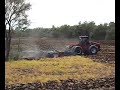 Case Steiger STX 500 hiting a tree with discs Case Steiger STX 500 hiting a tree with discs