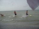 Guys skimboarding. (5)