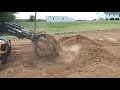 LX450 Cub-Cadet Yanmar Tractor Pushing Dirt with Loader