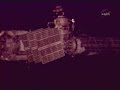 Retraction of the starboard solar array of Zarya module