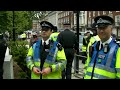 (now in HD) After a member of the Police Hugging Squad was detained for filming outside the USA Embassy in London earlier this month, the Undercover Anti-Terror Squad returned to spread the message of peace and love in order to prevent the end of the world by self-fulfilling prophecies of fear. We manage to hypnotise a young Policeman, perform a couple of songs, and find out how easy it is to get people to prove they are not terrorists. ... nwo protest police terror satire comedy london usa ...