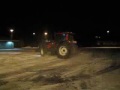 2 tractors drifting on snow