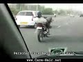 Crazy Biker On Cellphone Lying Down