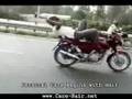 Crazy Biker On Cellphone Lying Down