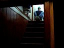 Derek(ME) snowskating down the stairs
