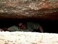Fat Guy getting stuck in a cave. Fat Guy getting stuck in a cave.