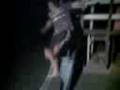 Lachy skateboarding down a slide