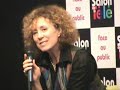 mireille dumas au salon de la tv.