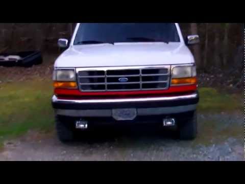 how to adjust headlights on a ford f 150