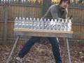 videos de Knife cutting 16 bottles.
