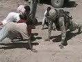Soldier and Iraqis Dance