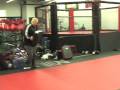 Cung Le Kicks Huge Camera Man across the room!!!