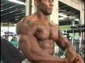 Bodybuilder Greg Davis poses pecs - excerpt from DVD Guns 13