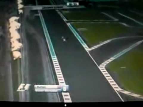 Kamui Kobayashi adelanta a  Jenson Button en Abu Dhabi 2009