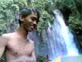 emay solving a pyraminx at tinago falls (iligan)