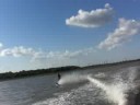 Water skiing in clear lake