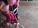 Bella and her bike.