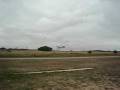 02 P-96 flying over landing strip - ultraligero