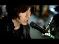 Watch the frontman play the title track off his band's latest, 'Suck It and See.' Recorded live in London, May 2011.