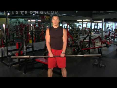 upright - Work the trapezius muscle using upright barbell exercises. Learn tips and techniques for working out the chest, back, shoulders, and arms in this weightlifti...