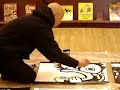 the-toronto-artist-mike-parsons-paints-at-a-demo-in-chapters.html