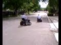 Lawn tractor vs. 50cc ATV drag race and crash