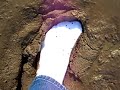 New white Nike tube socks vs Sticky mud 2