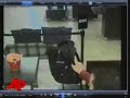 Raw Video: Bank Robber on Crutches