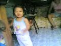 Lia walking with a chair