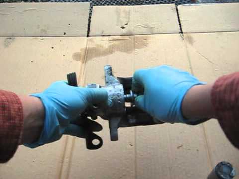 Rear brake job – inside the rear caliper on a vw audi parking brake and adjustment