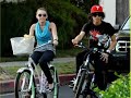 Miley Cyrus goes out bike ridding w. sister Brandi and Adam Sevani from Step Up 2 in Toluca Lake, Calif. on Tuesday.