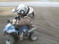 mini atv drifting in mud