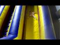 Lybie going down the  slide