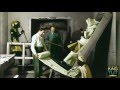 Conservación | Howard Carter envuelve una de las estatuas centinela