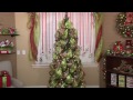 Decorating Christmas Tree With Decorative Mesh