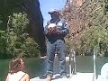 park ranger doug explains the features and wildlife of twin falls gorge, kakadu national park, nt, australia, 20th august 2008. in it he shows us a styrofoam ball used to determine, by toothmark length, whether there are any freshwater or saltwater crocs in the gorge and how many.