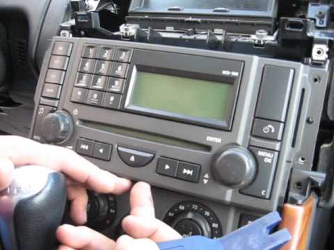 How to Remove Radio / CD Changer from Range Rover 2006 for Repair.
