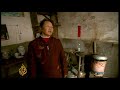 A new government report says that China's Three Gorges Dam project has doubled in cost. It will now require $25bn more than the initial cost of $25bn to resettle people displaced by the project and to fill the reservoir with enough water. A lack of rain and other problems are delaying the opening of the dam - designed to be the world's biggest flood control and hydropower facility. Al Jazeera's Melissa Chan reports.