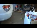 STI exhaust knocks over bottle