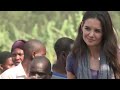 katie holmes is supporting the tommy hilfiger millennium promise campaign and took a trip to uganda to see the charity in action