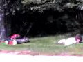 Funny Kid Mowing His Lawn