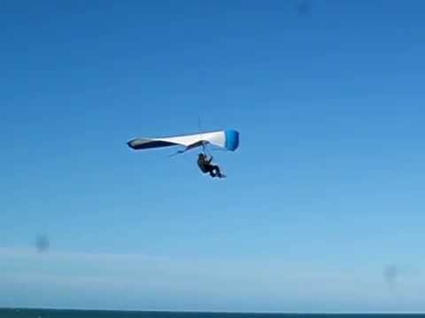 Guy Hang Gliding without a harness Thumbnail of Video