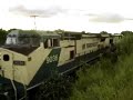 Trem puxado por uma Dash-9 indo em direção a Santos carregado. Ao entardecer o ronco do motor quebra a monotonia no pequeno lugarejo.